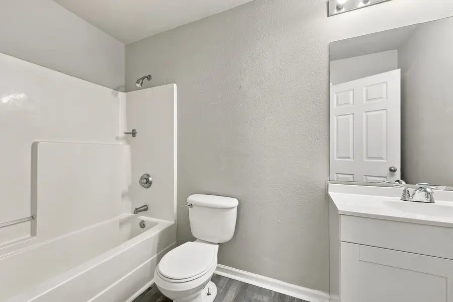 Bathroom with a tub shower
