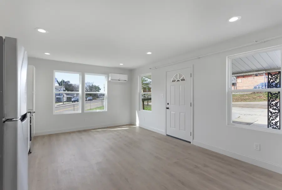 Living area with windows to the porch