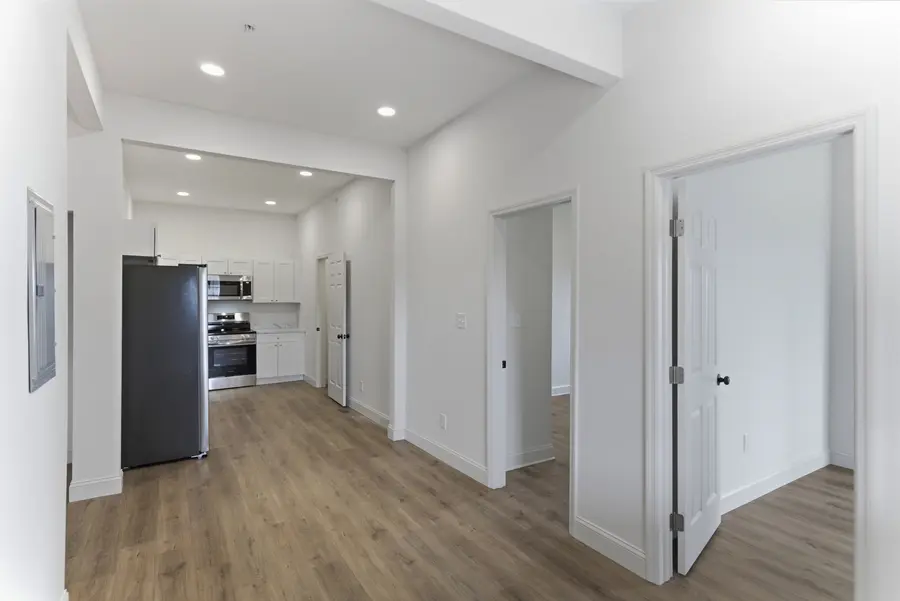 Unit living area looking through to the kitchen