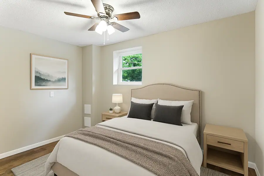 Light-filled staged bedroom in a rental property