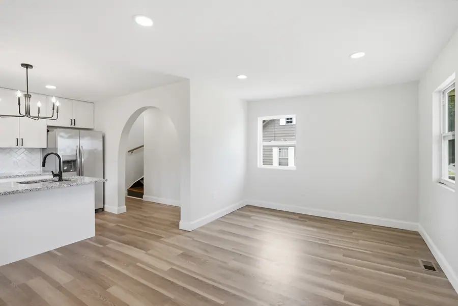 Archway between the living room and kitchen