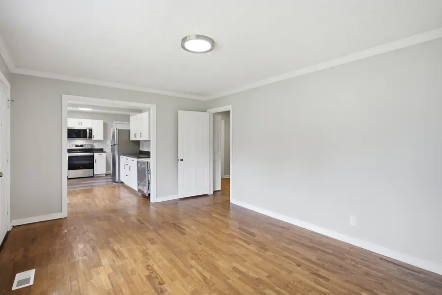 Open-plan living area looking through to the kitchen