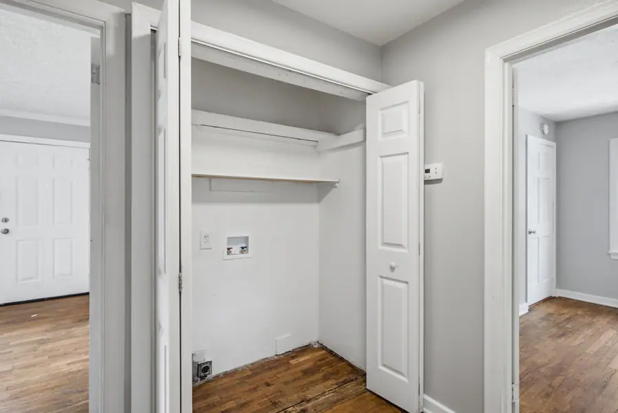 Laundry closet with washer and dryer hookups
