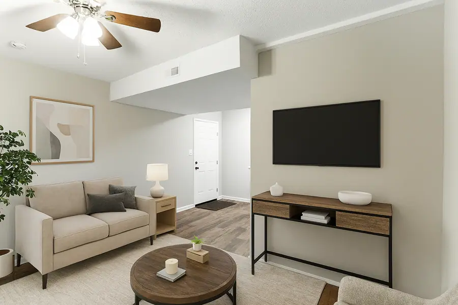 Staged sitting area with sofa and console table